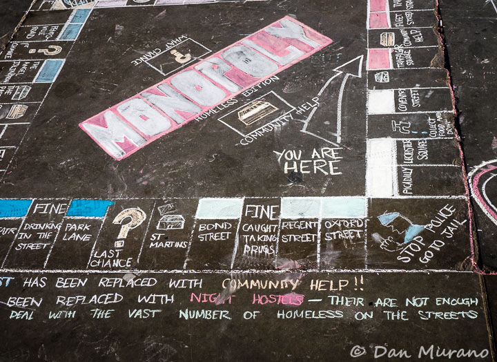 A chalk Monopoly board on Trafalgar Square plaza.