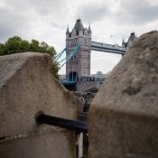 The Tower Bridge seen through the Tower ramparts.